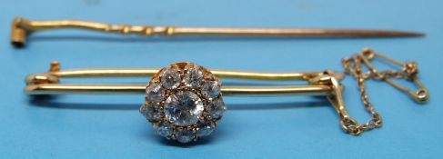 A yellow metal bar brooch set with 10 di