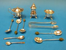 A hallmarked silver cruet set (Ldn, make