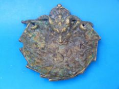 An antique bronze devil change or tip tr