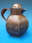 An Eastern jug, with copper finish and c