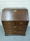 A small Georgian oak bureau, the fall fl