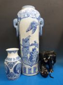 A tall Japanese blue and white vase, a s