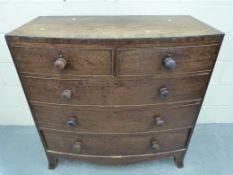 A Georgian mahogany bow-fronted chest of