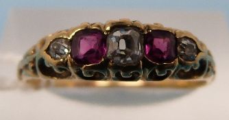 A yellow metal ring marked 18ct gold set