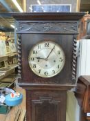 An oak-cased grandmother long cased cloc