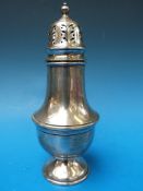 A hallmarked silver sugar sifter, B'ham