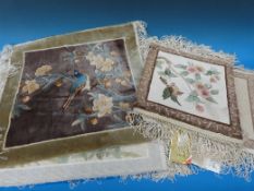 A collection of ten Chinese silk rugs