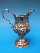 A Georgian hallmarked silver embossed cr