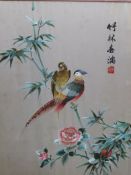 An Oriental silk picture of birds togeth