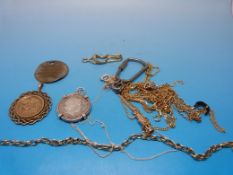 A quantity of 9ct gold/ yellow metal cha