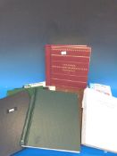 A box of sectional catalogues and a rema