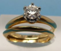 An 18ct gold Tiffany ring set with a rou