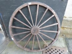 A wooden cartwheel (approximately 90cm d
