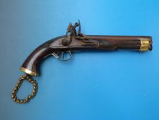 A 19thC flintlock pistol with captive ramrod brass mounts and brass chain