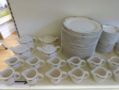 A Villeroy & Bosch 'Adriana' dinner service with 12 place settings of a dinner plate, large bowl,