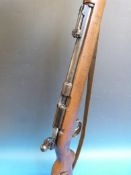 An Erma .22 single shot bolt action rifle serial number 8420.  PLEASE NOTE THAT A VALID RELEVANT