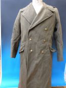 A general service 'dismounted 1940 pattern' greatcoat, size 7, dated 1950