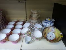 A pink ground part tea set with pedestal cups, beehive mark to base (possibly Vienna) and a