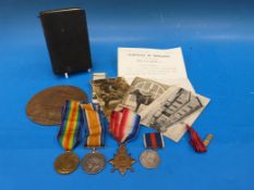 A set of three WW1 medals awarded 19052 Pte H Durn Wilts R, together with a death plaque to Pte.