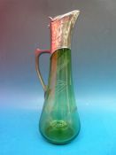 A Jugendstil pewter and cut glass claret jug c1890