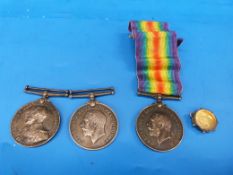A 1914-18 medal and Naval Long Service medal awarded to 161721 J Morgans Ch. Stoker HMS Leander,