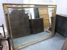 A very large mirror with ormolu style frame, 190x142cm overall