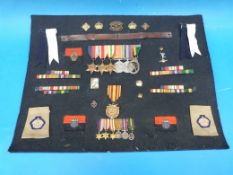 A collection of medals, badges etc relating to Major J N Evans, Royal Signals including Africa,