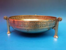 A rare WMF beaten brass Arts and Crafts fruit bowl raised on three shaped legs