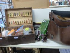 A collection of vintage fishing equipment in the whole, reels, rods including Greenheart fly rod,