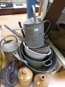 A collection of vintage galvanized garden items, scales