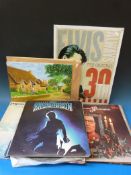 A quantity of LP's including Buddy Holly and Cliff Richard, various books/ephemera of Wiltshire