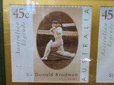 A large signed Sir Ian Botham cricketing photograph and Don Bradman 