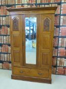 A satin walnut carved wardrobe (199cm tall x 126cm wide)