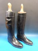 A pair of Stylo black riding boots with wooden trees