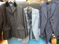 Two riding jackets and a child's side saddle habit approximate age 10 - 12 years (chest size 30