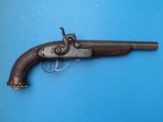 A percussion pistol converted from flintlock with brass butt cap, carved stock and silver wire
