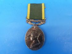 An Efficient Service medal (Canada) to Cpl  L.W. Andison CMSC