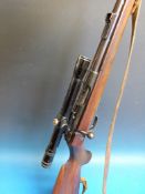 A Walker .22 bolt action rifle 34666 with BSA 4 x 20 scope.  PLEASE NOTE THAT A VALID RELEVANT