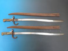 A pair of French bayonets - one dated 1868