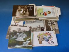 A box of postcards including comical, topographical, photographic, etc (approximately 200)