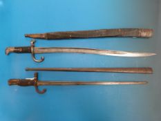 A French style late 19thC bayonet believed to be Greek, together with a Danish M1867 bayonet