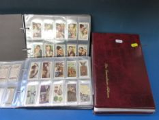 Four albums containing Gallaher, Churchman, Lambert and Butler etc cigarette cards including Allied