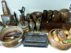 A collection of treen including carved vase, bear and owl wall pocket