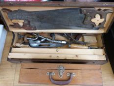 A toolbox of vintage woodworking tools including a Stanley No 5 1/2 plane, Spear & Jackson saw etc