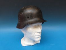 A German WW2 era helmet with leather lining