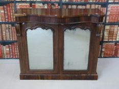 A 19thC rosewood chiffonier with serpentine front and mirror doors