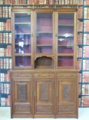 A 19thC mahogany glazed dresser with adjustable shelves and bobbin gallery pediment (248cm tall x