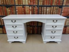A painted pine twin pedestal desk