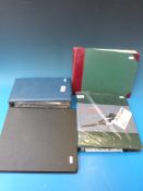 Four various albums and stockbooks of GB and world stamps