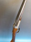 An F Beesley 12 bore double barrelled side by side box lock ejector shotgun with all over engraved